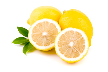 Fototapeta na wymiar Yellow Lemon citrus half slices with leaf isolated on white background