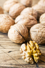 Walnuts on dark vintage wooden background. Walnut healthy food