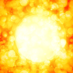 Background with bokeh effect. Blurred christmas sparkling lights for Xmas holiday design in golden colors. Vector