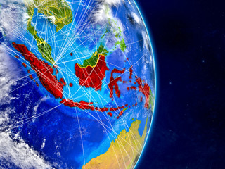Indonesia on planet Earth with networks. Extremely detailed planet surface and clouds.