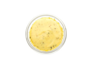Tasty yellow sauce in bowl on white background