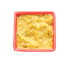 Tasty sauce in bowl on white background
