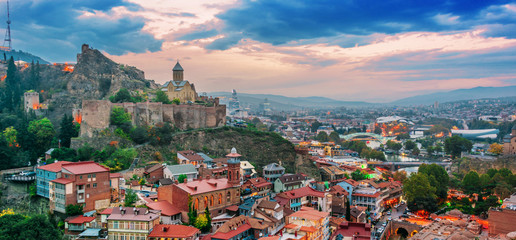 Panoramic view of Tbilisi, Georgia after sunset - obrazy, fototapety, plakaty