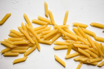 Italian Penne Rigate Macaroni Pasta raw food background or texture