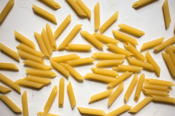 Italian Penne Rigate Macaroni Pasta raw food background or texture