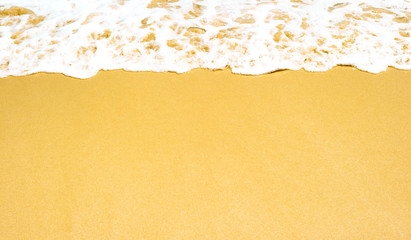 Sandy beach and beautiful tropical sea. Warm summer sea with blue water.