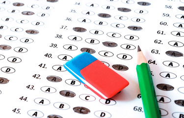Test answer sheet with pencil. Examination test. Education concept