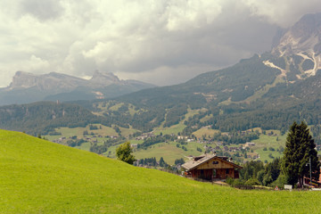 Fototapeta na wymiar panoramic view of the dolomite mountains. Mountain village Cortina di Ampezzo.
