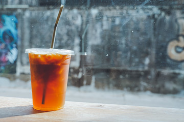 close up Iced americano with blur interior cafe background
