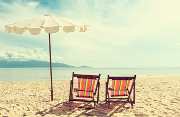 Beautiful beach. View of nice tropical beach with palms around. Holiday and vacation concept. Tropical beach. Beautiful tropical island.