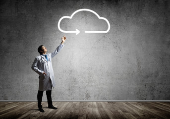 Conceptual image of doctor with cloud symbol