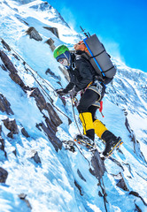  A climber reaching the summit of the mountain Everest