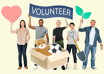 Happy diverse people holding volunteer banner