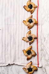 Scandinavian pastry Joulutorttu is traditional finnish and Swedish christmas pastry. It is traditionally made from puff pastry in the shape of a star or pinwheel and filled with prune jam and often du