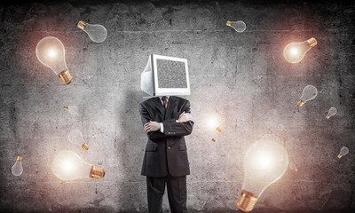 Businessman with monitor instead of head.