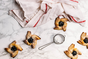 Scandinavian pastry Joulutorttu is traditional finnish and Swedish christmas pastry. It is traditionally made from puff pastry in the shape of a star or pinwheel and filled with prune jam and often du