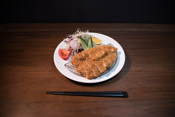 Close up view of plate with japanese food inside. Japan traditional food on wooden table. Selective focus