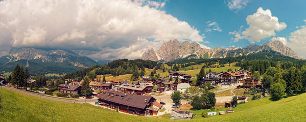 Fototapeta na wymiar Beluno, Italy-August 9, 2018: The mountain village of Cortina di Ampezzo.