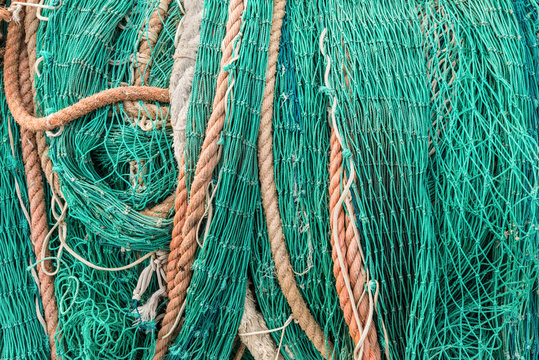 Close up a piled of commercial fishing net background