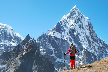 Fototapeta na wymiar Hiker with backpacks in Himalayas mountain, Nepal. Active sport concept.