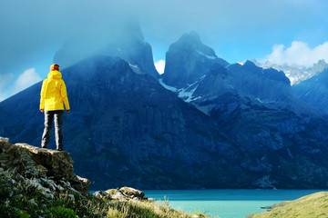 Active girl hiking in the mountains, Patagonia. Chile, Patagonia, Torres del Paine National Park