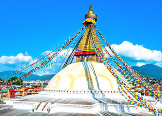 Bodhnath stupa in Kathmandu with buddha eyes and prayer flags, Nepal