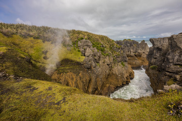 Punakaiki Pancake Rocks with blowholes in the Paparoa National Park, New Zealand