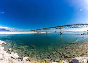 Naklejka na ściany i meble New Zealand's longest one-lane bridge over Haast River, South Westland