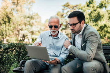 Business meeting outdoors.