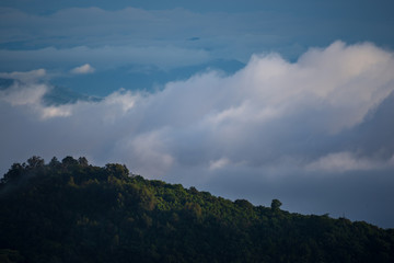 view of mountains and clouds