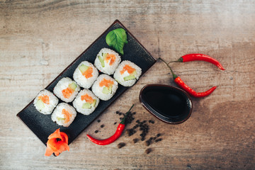 sushi on black plate