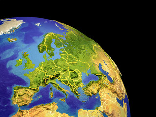 Orbit view of Europe with country borders. Plastic planet surface with mountains and blue oceans with waves.