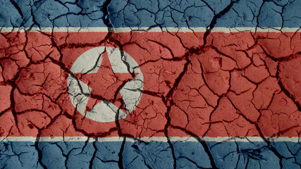 Political Crisis Or Environmental Concept: Mud Cracks With North Korea Flag