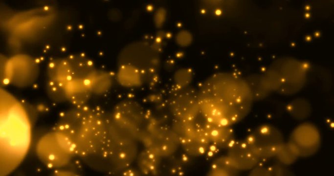 gold christmas digital glitter sparks golden particles out of focus bokeh flowing on gold background, holiday festive happy new year event
