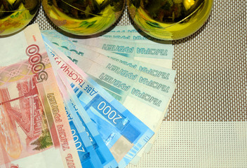 Christmas balls.  Money to buy gifts. Christmas. Russian banknotes. Capital.