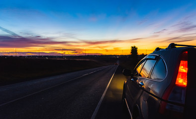 road car sunset