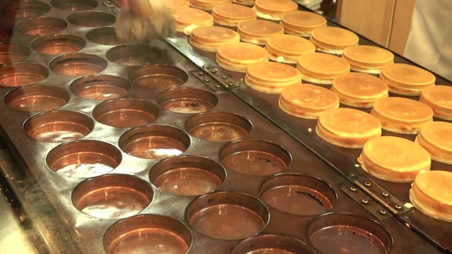 Time lapse shot of process of making Japanese style pancake, Ohbanyaki,Imagawayaki