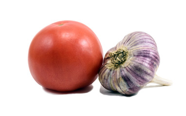 Тomato and garlic head isolated on white background