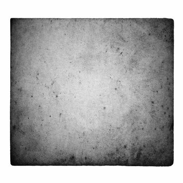 Black and white film frame with light leaks and grain isolated on white background.