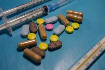 pills on blue background