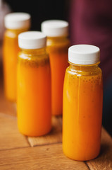 Small cute bottles of fresh juice