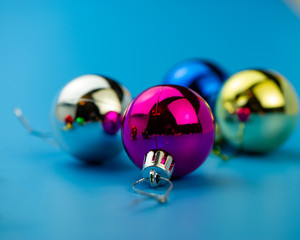 Christmas balls on a blue background. Close-up.