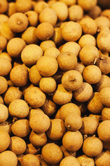 a lot Langsat or Longan in shop on counter