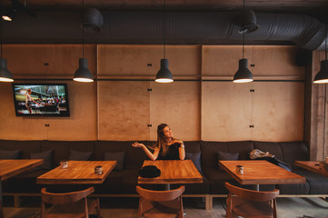 Women in Cozy and minimal urban restaurant interior design 