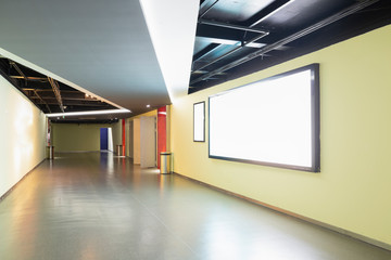 The blank advertisement column on the wall of the corridor