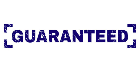 GUARANTEED text seal print with corroded texture. Text caption is placed between corners. Blue vector rubber print of GUARANTEED with retro texture.