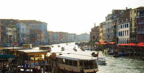 Traffic of boats in a typical canal in Venice city