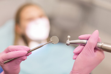 dentist hands making dental procedure