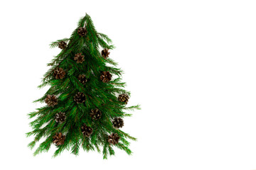 Christmas tree made of fir branches and pine cones isolated on white Holiday concept. Flat lay, top view