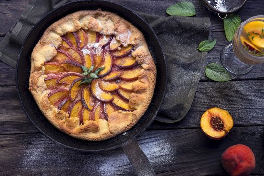 Overhead view of crostata with peaches